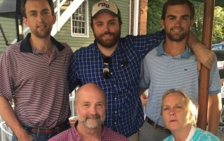 Erik center and family