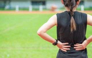 Teen athlete experiencing lower back pain, possible pars fracture (spondylolysis)
