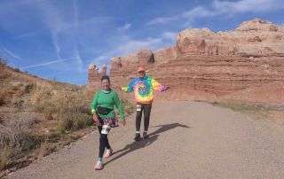 Tom and Fran Brand running together in a half marathon after Tom’s glioblastoma brain surgery